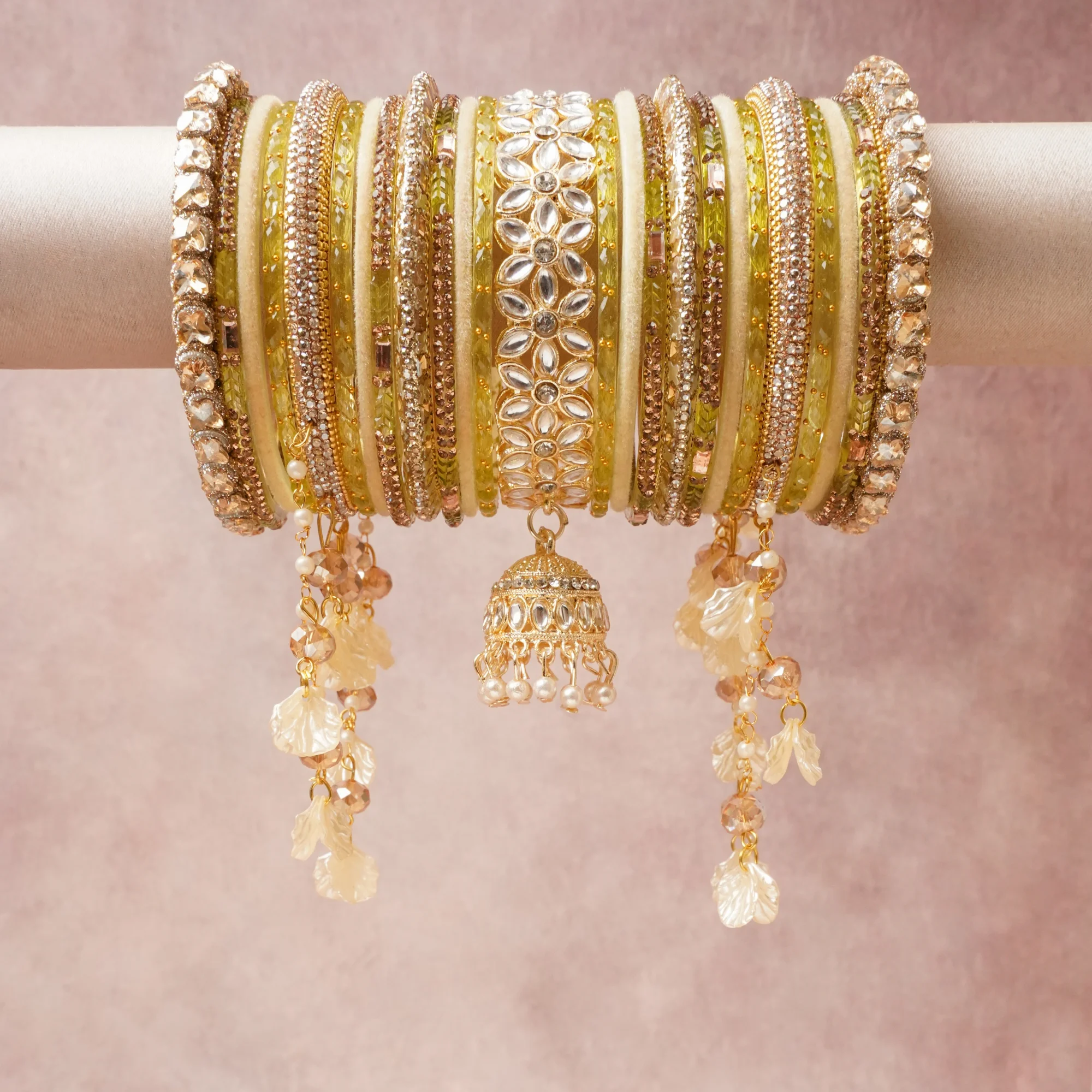 A majestic Muted Chartreuse set, complemented by Brilliant White, Metallic Gold, Champagne featuring Glass, Gold-toned Metal, Synthetic Stones, Imitation Pearls, Mother-of-Pearl Imitation, Faceted Glass.
Rich, ceremonial, and designed to be passed through generations.